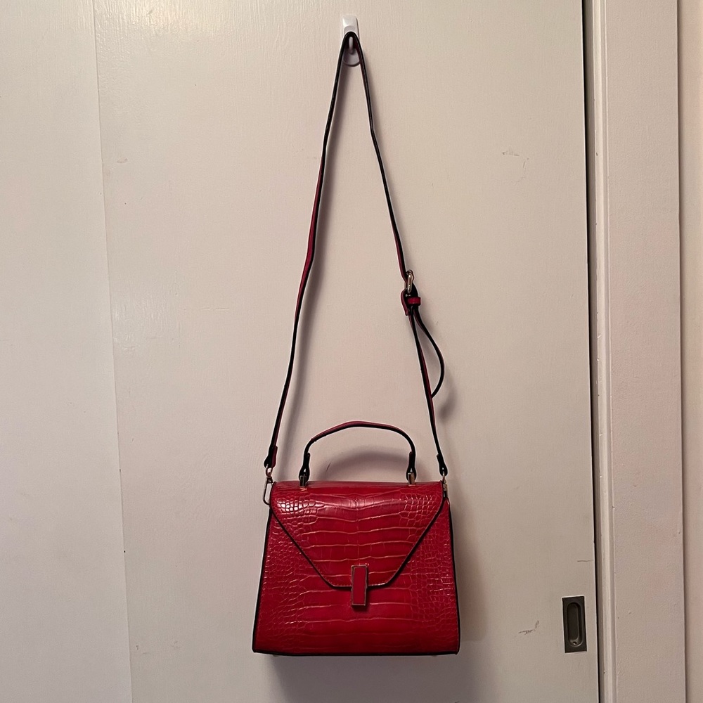 Red faux crocodile skin bag